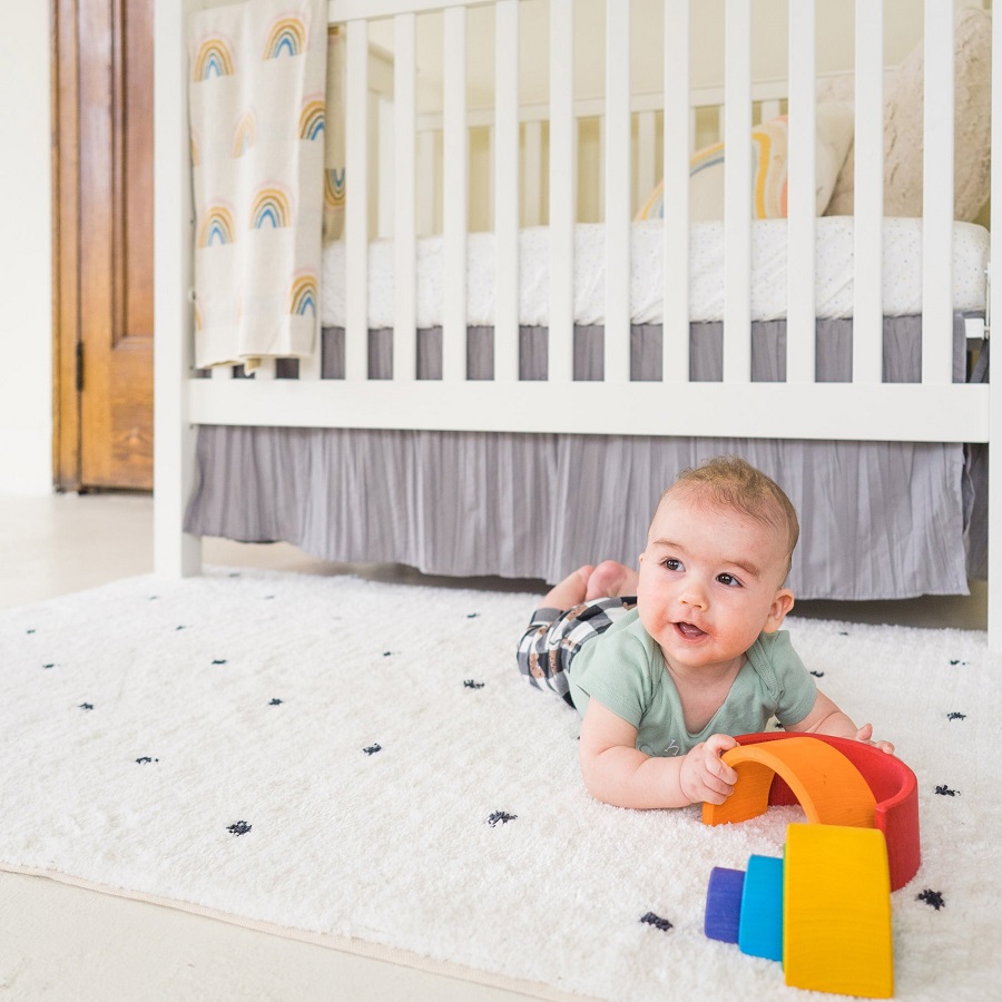 baby fell off bed onto carpet